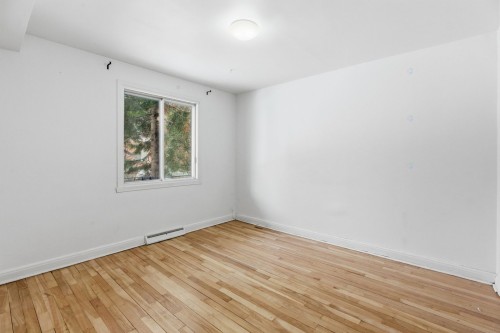 Chambre à coucher - 1-7431 Rue De Lanaudière, Montréal (Villeray/Saint-Michel/Parc-Extension), QC - Indoor Photo Showing Other Room