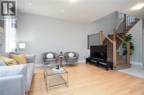 Living area featuring light wood-style floors and recessed lighting - 346 Chokecherry Crescent, Waterloo, ON - Indoor Photo Showing Living Room