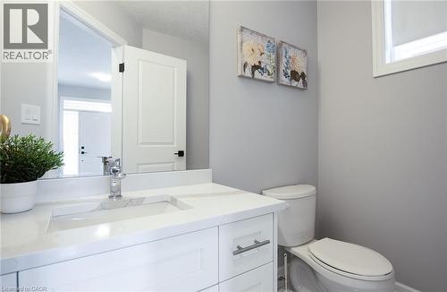 Half bathroom with vanity and toilet - 346 Chokecherry Crescent, Waterloo, ON - Indoor Photo Showing Bathroom