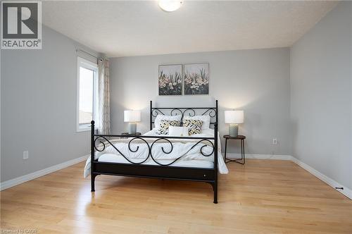 Bedroom with light wood-style flooring and baseboards - 346 Chokecherry Crescent, Waterloo, ON - Indoor Photo Showing Other Room