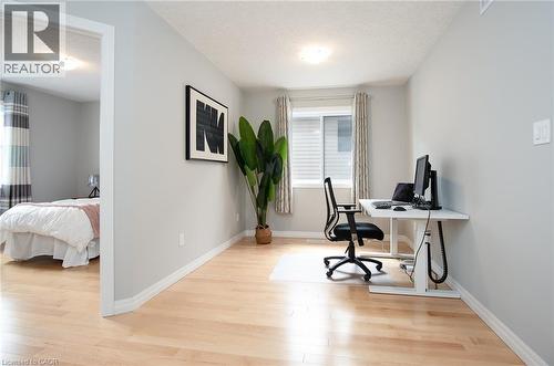 Office area featuring light wood-style flooring and a textured ceiling - 346 Chokecherry Crescent, Waterloo, ON - Indoor Photo Showing Office
