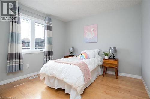Bedroom featuring light wood-type flooring and baseboards - 346 Chokecherry Crescent, Waterloo, ON - Indoor Photo Showing Bedroom