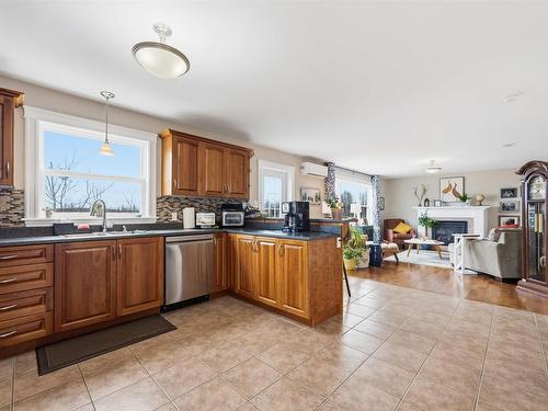 397 Hemlock Drive, Upper Tantallon, NS - Indoor Photo Showing Kitchen With Fireplace
