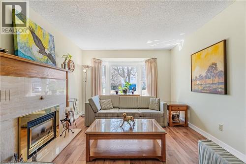 78 Esther Avenue, Cambridge, ON - Indoor Photo Showing Living Room With Fireplace