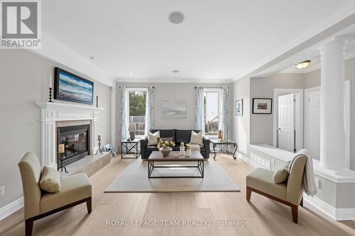 144 Whernside Terrace, Ottawa, ON - Indoor Photo Showing Living Room With Fireplace