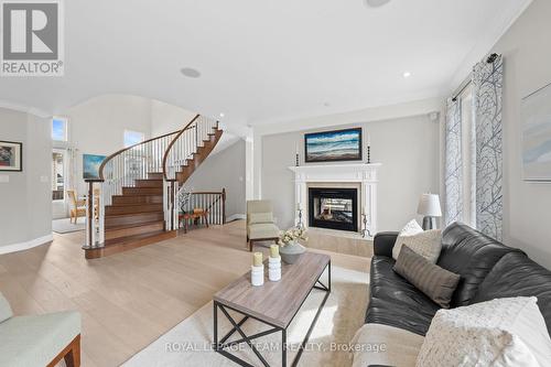 144 Whernside Terrace, Ottawa, ON - Indoor Photo Showing Living Room With Fireplace