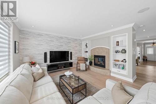 144 Whernside Terrace, Ottawa, ON - Indoor Photo Showing Living Room With Fireplace