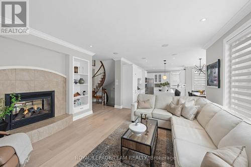 144 Whernside Terrace, Ottawa, ON - Indoor Photo Showing Living Room With Fireplace