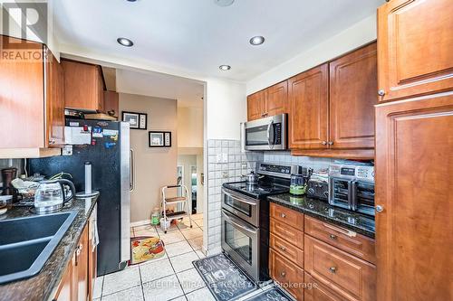 7150 Harwick Drive, Mississauga, ON - Indoor Photo Showing Kitchen With Double Sink
