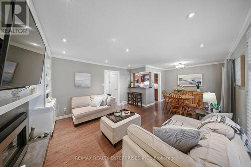 23 Cowan Boulevard, Cambridge, ON - Indoor Photo Showing Living Room With Fireplace