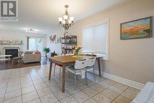 1908 Coronation Drive, London North (North E), ON - Indoor Photo Showing Dining Room With Fireplace