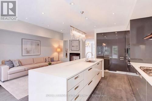 Kitchen and Family Room virtually staged - 66 Compass Way, Mississauga, ON - Indoor Photo Showing Kitchen With Upgraded Kitchen