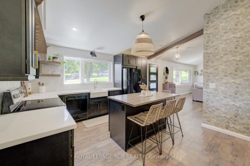 22 Smith Drive, Mapleton, ON - Indoor Photo Showing Kitchen With Double Sink