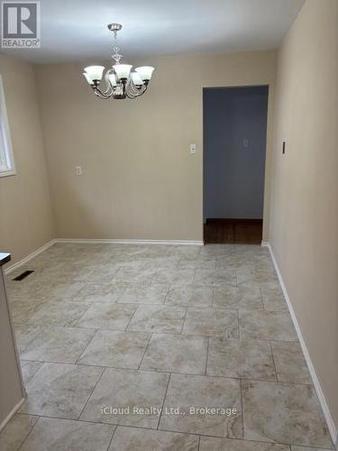 Ceramic Flooring - 4174 Woodington Drive, Mississauga, ON - Indoor Photo Showing Other Room