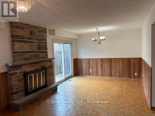 Parquet Wood Flooring - 4174 Woodington Drive, Mississauga, ON - Indoor With Fireplace