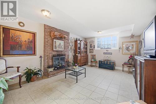 Large Family Room with Brick Fireplace - 6330 Lorca Crescent, Mississauga, ON - Indoor With Fireplace