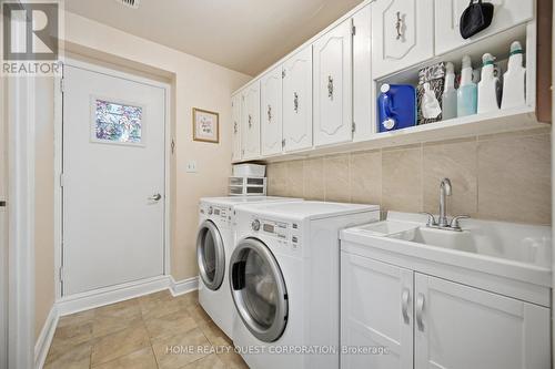 Main Floor Laundry with Separate Entrance - 6330 Lorca Crescent, Mississauga, ON - Indoor Photo Showing Laundry Room