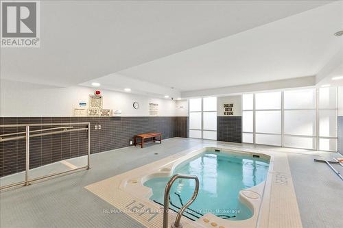 303 - 1600 Charles Street, Whitby, ON - Indoor Photo Showing Other Room With In Ground Pool
