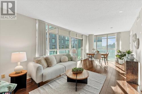 303 - 1600 Charles Street, Whitby, ON - Indoor Photo Showing Living Room