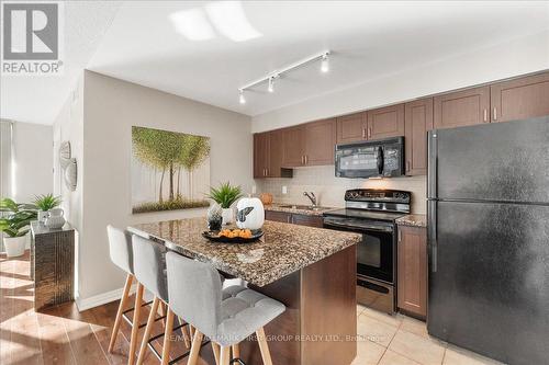 303 - 1600 Charles Street, Whitby, ON - Indoor Photo Showing Kitchen