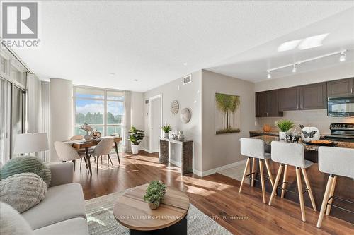 303 - 1600 Charles Street, Whitby, ON - Indoor Photo Showing Living Room