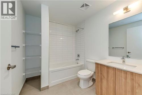 Bathroom with vanity,  shower combination, and light tile patterned floors - 770 Whitlock Avenue Unit# 606, Milton, ON - Indoor Photo Showing Bathroom