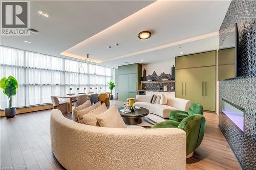 Community lobby featuring a tray ceiling - 770 Whitlock Avenue Unit# 606, Milton, ON - Indoor