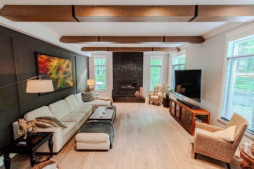 Salon - 9 Place D'Harques, Lorraine, QC - Indoor Photo Showing Living Room With Fireplace