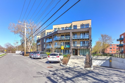Front of Structure - 410-145 Boul. Bouchard, Dorval, QC - Outdoor With Balcony With Facade