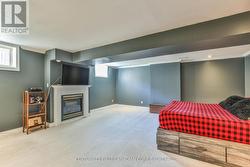 lower primary bedroom with fireplace - 