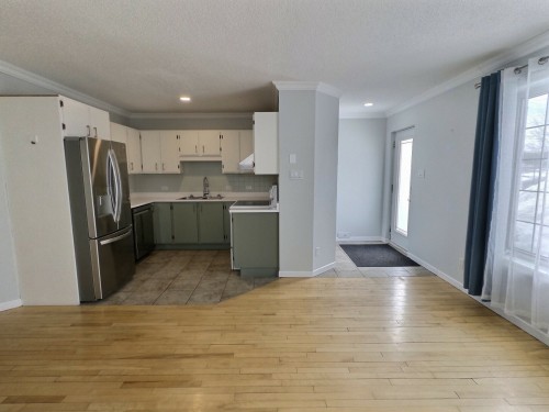 Hall d'entrée/Vestibule - 521 Av. Richard, Rouyn-Noranda, QC - Indoor Photo Showing Kitchen With Double Sink