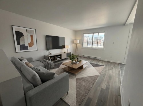 Salon - 323 Rue Hurteau, Dollard-Des-Ormeaux, QC - Indoor Photo Showing Living Room
