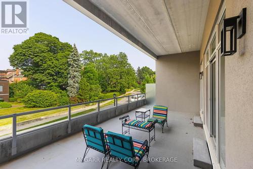 Partially covered terrace - 507 - 77 Yates Street, St. Catharines (Downtown), ON - Outdoor With Deck Patio Veranda With Exterior