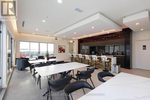 Bar and three appliances - 507 - 77 Yates Street, St. Catharines (Downtown), ON - Indoor Photo Showing Dining Room