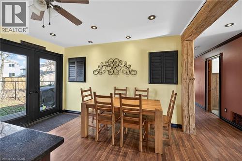 Dining space featuring a ceiling fan, recessed lighting, dark wood-style floors, and french doors - 703 Dunn Avenue, Hamilton, ON - Indoor Photo Showing Dining Room