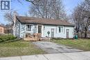 View of front facade with a chimney and roof with shingles - 703 Dunn Avenue, Hamilton, ON  - Outdoor 
