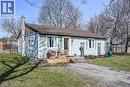 View of front facade with a chimney and roof with shingles - 703 Dunn Avenue, Hamilton, ON  - Outdoor 