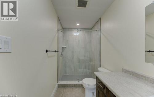 Full bath featuring vanity, a stall shower, and recessed lighting - 113 Walter Street, Kitchener, ON - Indoor Photo Showing Bathroom