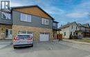View of front of property with an attached garage, driveway, and brick siding - 113 Walter Street, Kitchener, ON  - Outdoor 