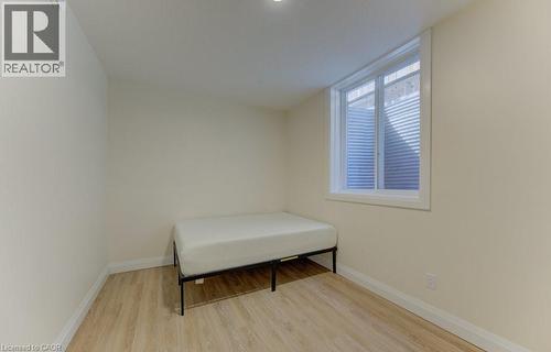 Bedroom with light wood finished floors and baseboards - 113 Walter Street, Kitchener, ON - Indoor Photo Showing Bedroom