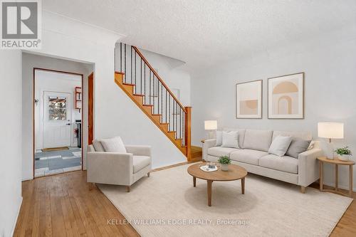 Digitally Staged - 23 Clifford Street, Hamilton, ON - Indoor Photo Showing Living Room