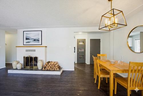 2768 Valleyview Drive, Kamloops, BC - Indoor Photo Showing Dining Room With Fireplace