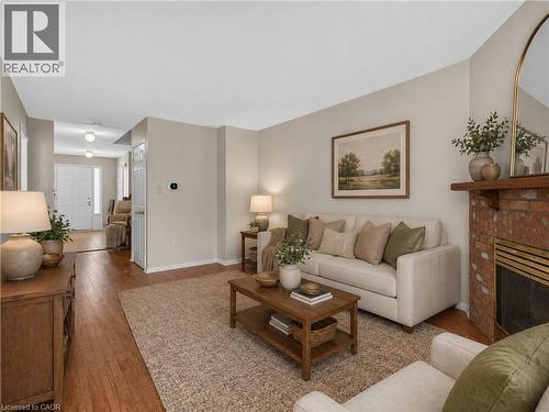 Virtually Staged / Enhanced - 86 Rita Avenue, Hamilton, ON - Indoor Photo Showing Living Room With Fireplace