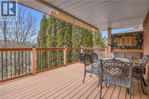 Wooden terrace featuring outdoor dining area - 228 Michener Crescent, Kitchener, ON - Outdoor With Deck Patio Veranda With Exterior