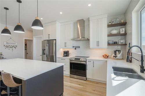 23 Murano Cove, Steinbach, MB - Indoor Photo Showing Kitchen With Double Sink With Upgraded Kitchen