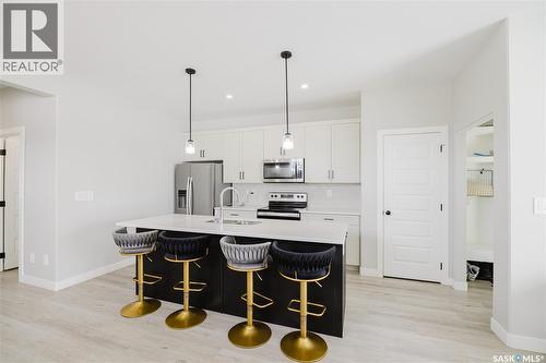 202 Cowessess Road, Saskatoon, SK - Indoor Photo Showing Kitchen With Stainless Steel Kitchen With Upgraded Kitchen