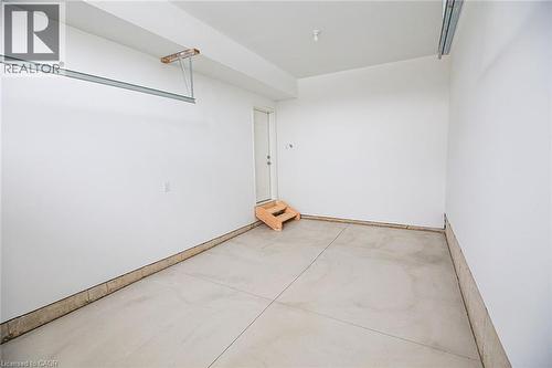 Unfurnished room with concrete flooring - 40 Pietz Avenue, Welland, ON - Indoor Photo Showing Other Room