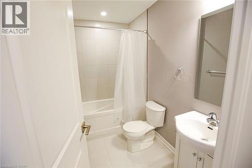 Full bath featuring vanity, shower / tub combo with curtain, light tile patterned floors, and recessed lighting - 40 Pietz Avenue, Welland, ON - Indoor Photo Showing Bathroom