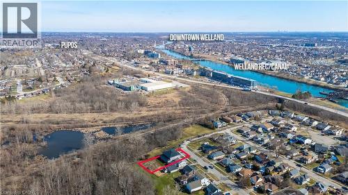 View of property location featuring a large body of water, nearby suburban area, and property parcel outlined - 40 Pietz Avenue, Welland, ON - Outdoor With View