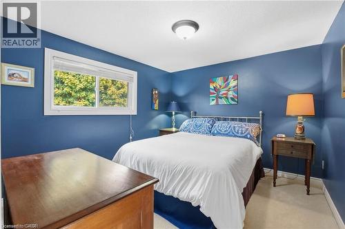 Bedroom with baseboards and light carpet - 668 Tomahawk Crescent, Ancaster, ON - Indoor Photo Showing Bedroom